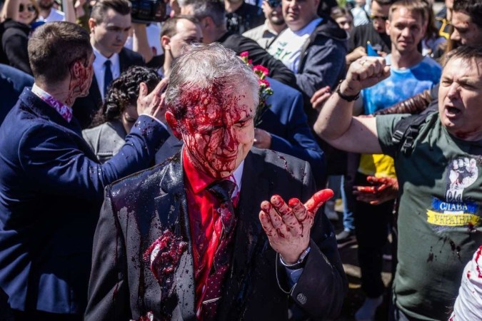 Russian Ambassador to Poland Sergey Andreev after being hit with red paint in Warsaw