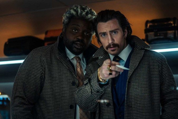 Bryan Tyree Henry e Aaron Taylor-Johnson formam dupla inseparável
    