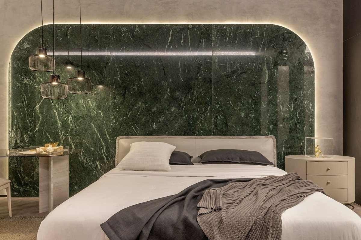 A Relato Arquitetos explorou o mármore italiano verde Guatemala 