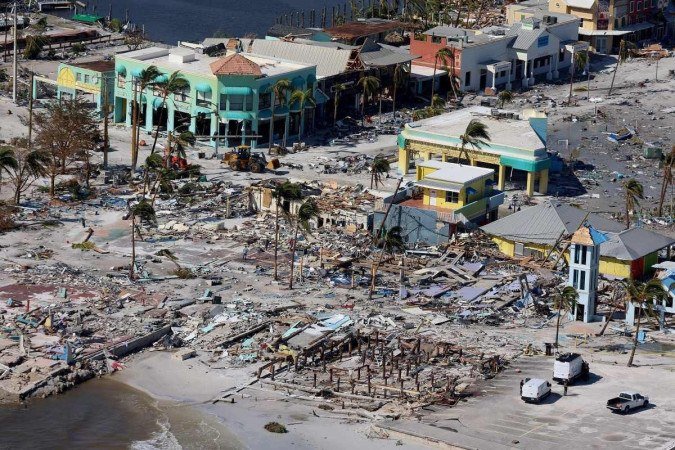 Vista aérea de edifícios danificados pelo furacão Ian em Fort Myers Beach, Flórida, em 29 de setembro de 2022 - (crédito: Getty Images via AFP) Vista aérea de edifícios danificados pelo furacão Ian em Fort Myers Beach, Flórida, em 29 de setembro de 2022 - (crédito: Getty Images via AFP)