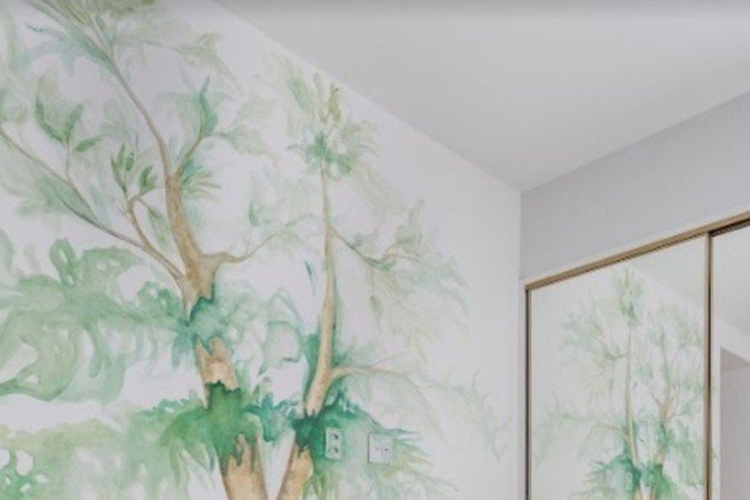 Detalhe na parede traz paz e natureza ao espaço 