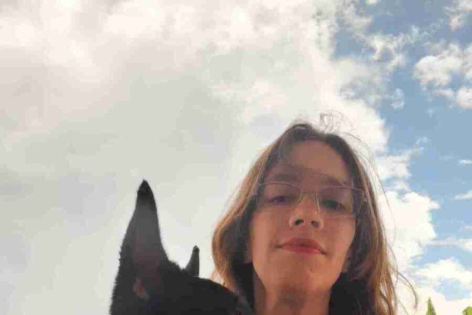 Raquel Sampaio e o cão de pastoreio Cícero