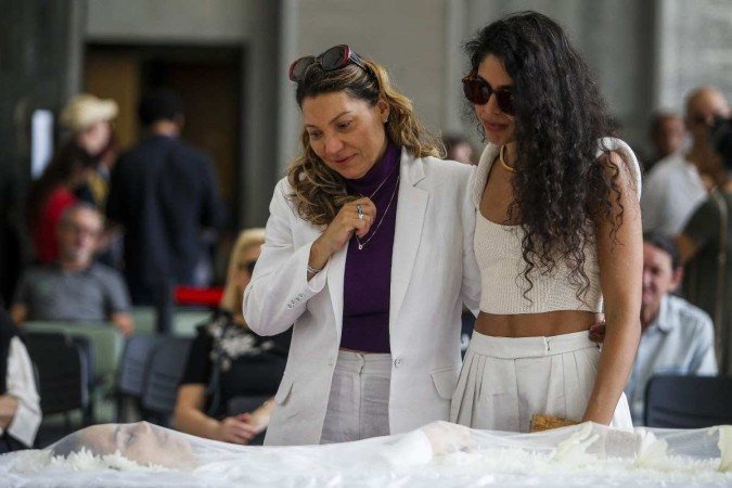 Janja e Flora Gil se despedem de Gal Costa - (crédito: AFP) Janja e Flora Gil se despedem de Gal Costa - (crédito: AFP)