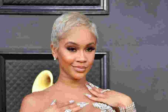  US rapper Saweetie arrives for the 64th Annual Grammy Awards at the MGM Grand Garden Arena in Las Vegas on April 3, 2022. (Photo by ANGELA  WEISS / AFP)
      