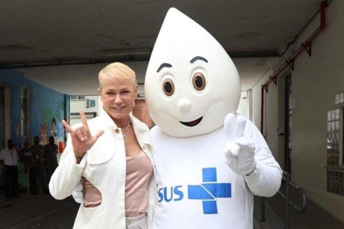 Xuxa e Zé Gotinha em campanha de multivacinação do Ministério da Saúde - (crédito: Ministério da Saúde/Divulgação) Xuxa e Zé Gotinha em campanha de multivacinação do Ministério da Saúde - (crédito: Ministério da Saúde/Divulgação)