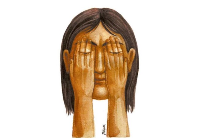 Mulher com a mão a frente do rosto, sobre os olhos. Violência. Feminicídio. Abuso. Estupro. -  (crédito: Fernando Lopes/CB/D.A Press)