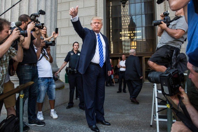 Trump chegando para servir como jurado na cidade de Nova York em 2015 - (crédito: Getty Images) Trump chegando para servir como jurado na cidade de Nova York em 2015 - (crédito: Getty Images)