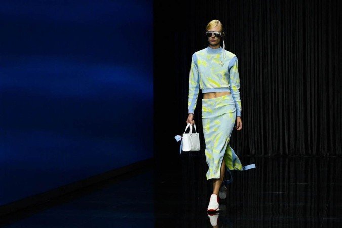  A model presents a creation for Ferrari's Women's and Men's Spring Summer 2023 fashion collection on September 25, 2022 as part of the Fashion Week in Milan. (Photo by Miguel MEDINA / AFP)

      