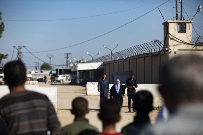 O porta-voz da polícia de Cabul, Khalid Zadran, disse que a explosão ocorreu em um bairro de Dasht-e-Barchi -  (crédito: Delil Souleiman / AFP)