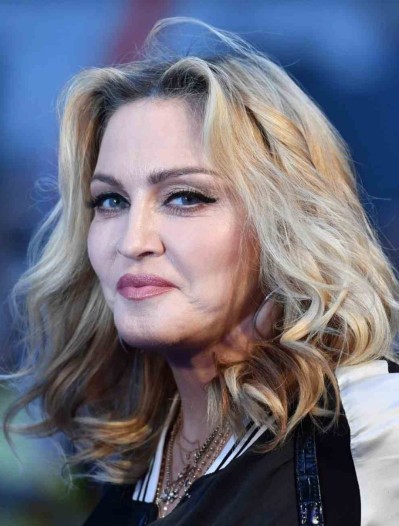 Madonna chegou ao Brasil nesta segunda-feira (29/4), após fazer os últimos shows na Cidade do México -  (crédito: AFP)