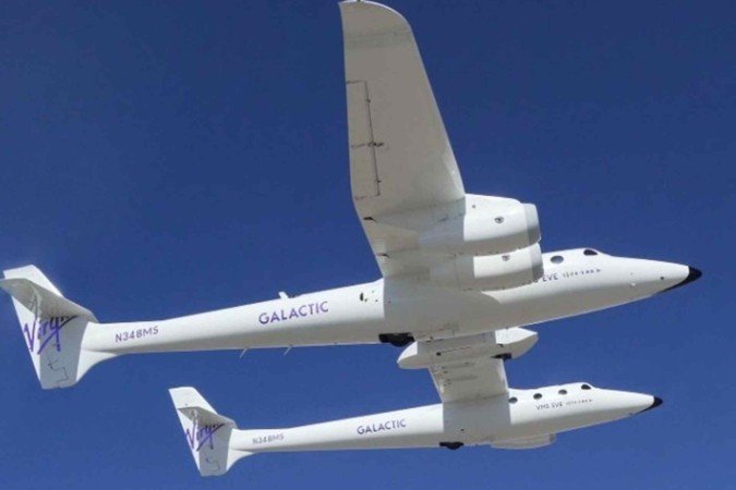 A missão da Virgin Galactic será feita a bordo de um avião espacial (foto), adaptado para voar na órbita da Terra
- (crédito: Reprodução/Instagram/@virgingalactic) A missão da Virgin Galactic será feita a bordo de um avião espacial (foto), adaptado para voar na órbita da Terra
- (crédito: Reprodução/Instagram/@virgingalactic)