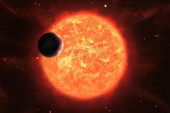 Gigante gasoso deveria ter sido engolido por sua estrela
- (crédito: Getty Images) Gigante gasoso deveria ter sido engolido por sua estrela
- (crédito: Getty Images)