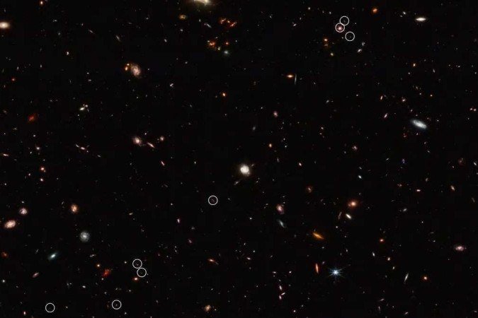(crédito: NASA, ESA, CSA, Feige Wang (University of Arizona), and Joseph DePasquale (STScI)) (crédito: NASA, ESA, CSA, Feige Wang (University of Arizona), and Joseph DePasquale (STScI))