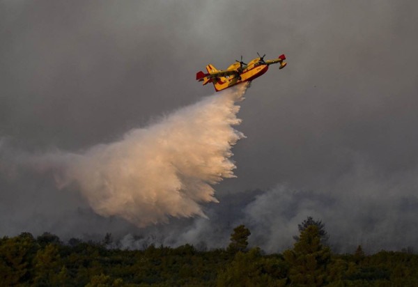 Reprodução/Aris Messinis / AFP