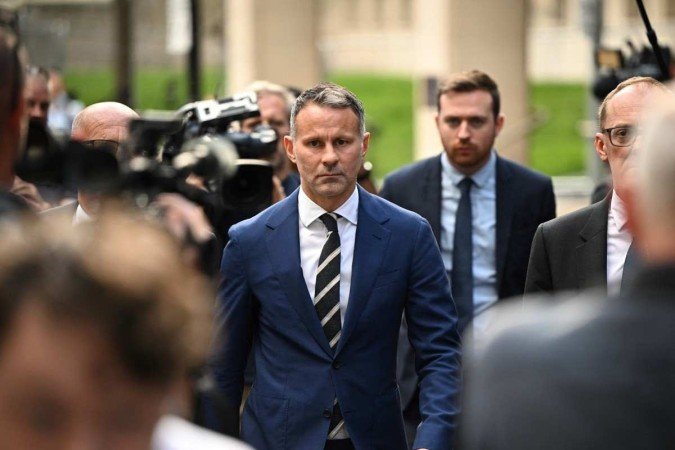 Ryan Giggs: ex-jogador do Manchester United foi inocentado das acusações de ex-namorada em caso de violência doméstica - (crédito: Reprodução/Oli SCARFF/AFP) Ryan Giggs: ex-jogador do Manchester United foi inocentado das acusações de ex-namorada em caso de violência doméstica - (crédito: Reprodução/Oli SCARFF/AFP)