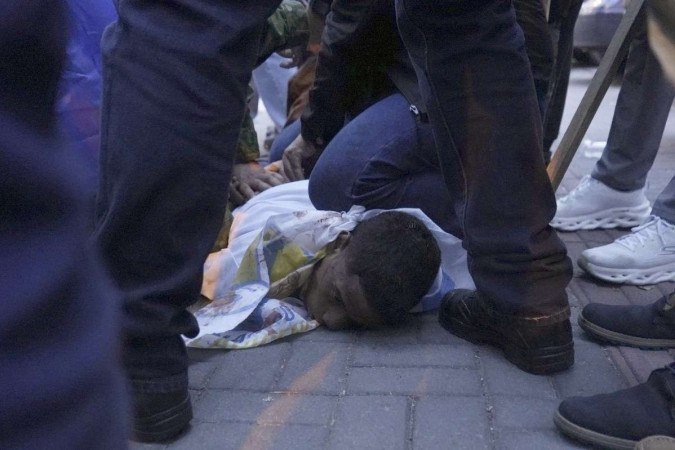 Um outro suspeito de envolvimento no crime foi detido pela polícia. - (crédito: AFP) Um outro suspeito de envolvimento no crime foi detido pela polícia. - (crédito: AFP)