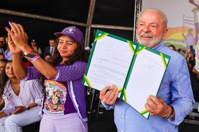 Presidente Lula durante a cerimônia de encerramento da 7ª Marcha das Margaridas, na Esplanada - (crédito: Ricardo Stuckert/PR) Presidente Lula durante a cerimônia de encerramento da 7ª Marcha das Margaridas, na Esplanada - (crédito: Ricardo Stuckert/PR)