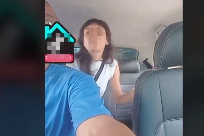Além de cuspir, a mulher xingou e bateu a porta do carro diversas vezes -  (crédito: Reprodução/TikTok/luizoliveir3)