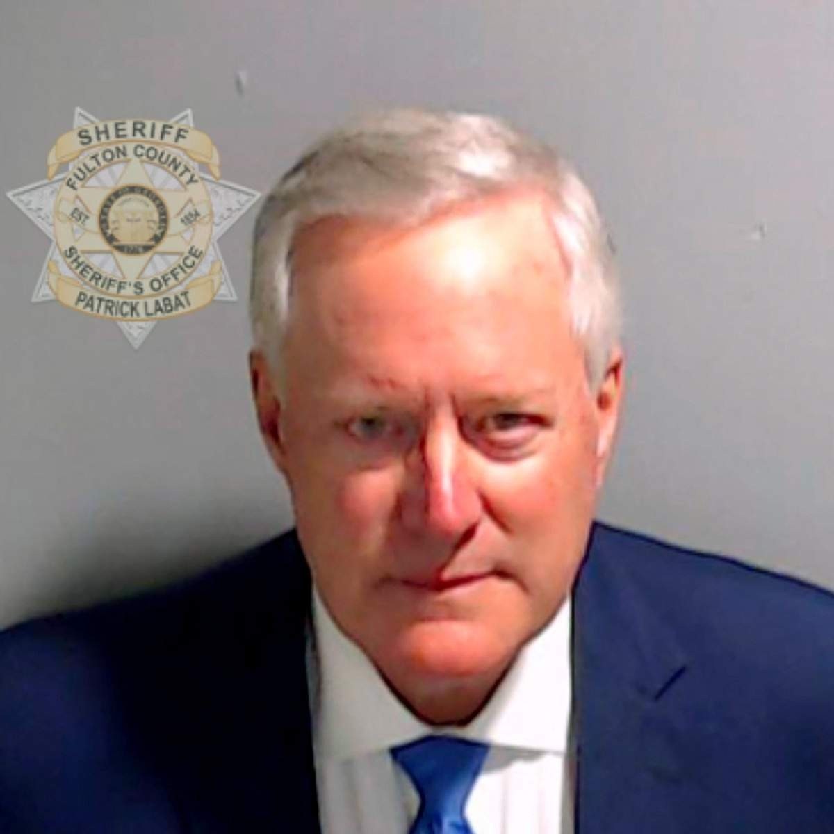  ATLANTA, GEORGIA - AUGUST 24: In this handout provided by the Fulton County Sheriff's Office, former White House Chief of Staff Mark Meadows poses for his booking photo on August 24, 2023 in Atlanta, Georgia. Former President Donald Trump and 18 others facing felony charges in the indictment related to tampering with the 2020 election in Georgia have been ordered to turn themselves in by August 25.   Fulton County Sheriff's Office via Getty Images/AFP (Photo by Handout / GETTY IMAGES NORTH AMERICA / Getty Images via AFP)       