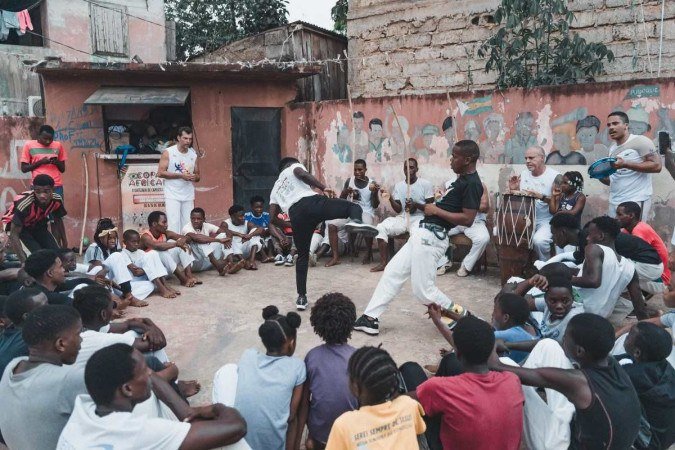 3° edição do Papo de Capoeira valoriza a resistência cultural e a inclusão social com workshops, rodas e apresentações artísticas.
- (crédito: Arquivo pessoal) 3° edição do Papo de Capoeira valoriza a resistência cultural e a inclusão social com workshops, rodas e apresentações artísticas.
- (crédito: Arquivo pessoal)
