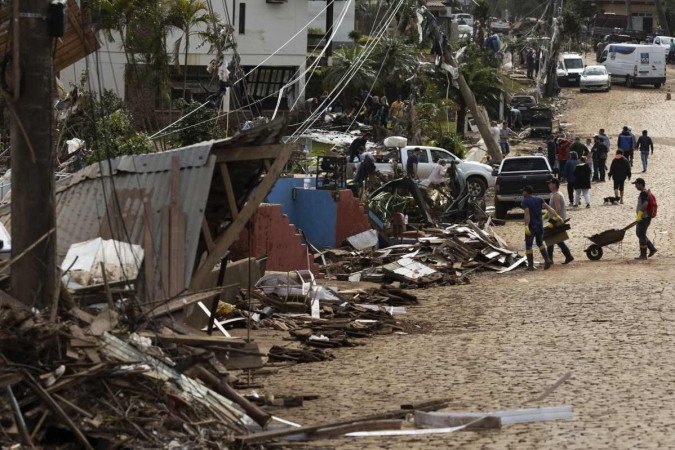 As enchentes no Rio Grande do Sul também afetaram a economia gaúcha - (crédito: AFP) As enchentes no Rio Grande do Sul também afetaram a economia gaúcha - (crédito: AFP)