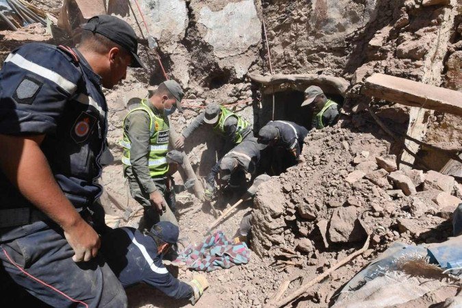 O balanço provisório de mortos subiu para 2.497 pessoas -  (crédito:  AFP)