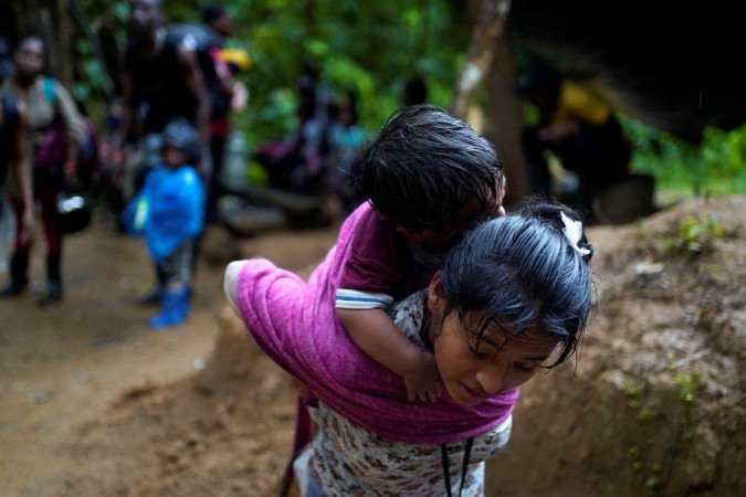Imigrantes no lado colombiano da Passagem de Darién, uma das áreas fronteiriças mais perigosas do mundo - (crédito: Reuters) Imigrantes no lado colombiano da Passagem de Darién, uma das áreas fronteiriças mais perigosas do mundo - (crédito: Reuters)