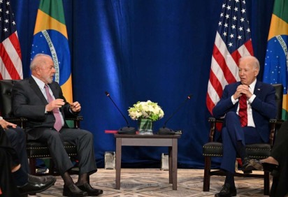 Lula e Biden conversaram por telefone, e o americano destacou a importância do Brasil para preservar florestas e combater a mudança climática -  (crédito:  AFP)