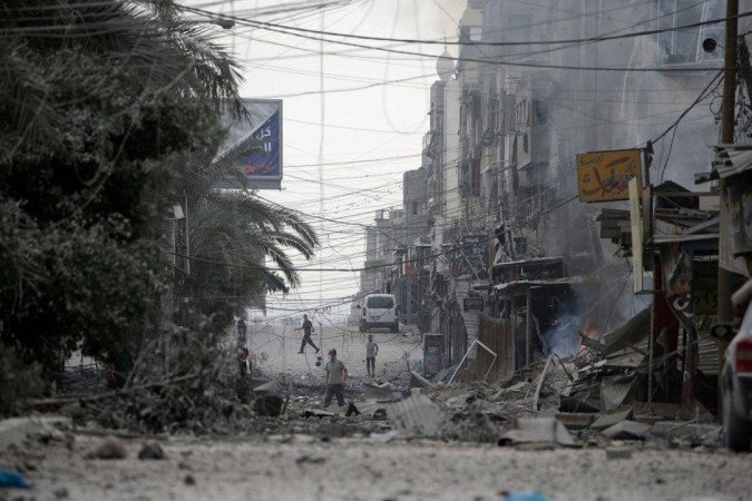 Ruas e prédios destruídos na Cidade de Gaza nesta sexta-feira (27) - (crédito: MOHAMMED SABER/EPA-EFE/REX/Shutterstock) Ruas e prédios destruídos na Cidade de Gaza nesta sexta-feira (27) - (crédito: MOHAMMED SABER/EPA-EFE/REX/Shutterstock)