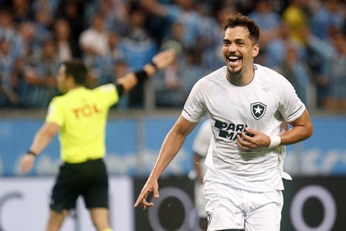 No primeiro turno, o Botafogo derrotou o Grêmio em Porto Alegre e encerrou uma sequência negativa diante do clube gaúcho. - Foto: Vitor Silva/Botafogo