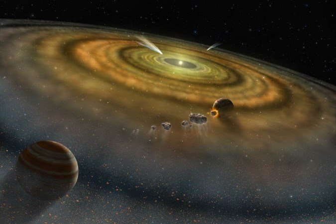 Imagem artística da formação de um sistema planetário, composto de rochas e metais, inclusive de Imagem artística da formação de um sistema planetário, composto de rochas e metais, inclusive de