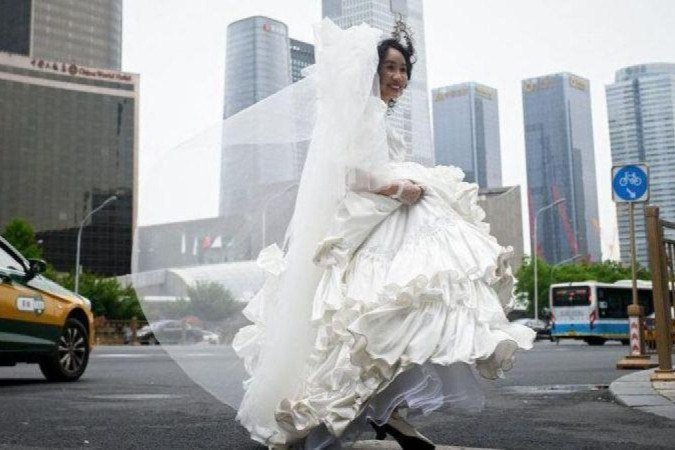 Jovens chineses estão se afastando de escolhas tradicionais como casar e ter filhos - (crédito: Getty) Jovens chineses estão se afastando de escolhas tradicionais como casar e ter filhos - (crédito: Getty)
