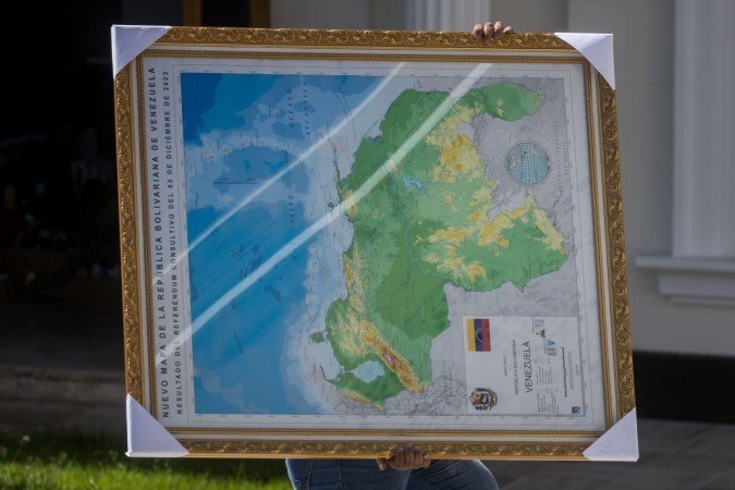Mapa da Venezuela com a região da Guiana anexada - (crédito: MIGUEL GUTIERREZ/EPA-EFE/REX/Shutterstock) Mapa da Venezuela com a região da Guiana anexada - (crédito: MIGUEL GUTIERREZ/EPA-EFE/REX/Shutterstock)