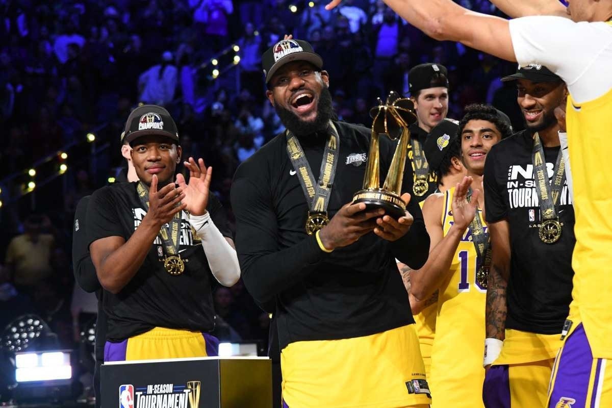LeBron James #23 of the Los Angeles Lakers receives the In-Season Tournament MVP Trophy after winning the In-Season Tournament Championship game against the Indiana Pacers on December 9, 2023 at T-Mobile Arena in Las Vegas, Nevada. 
