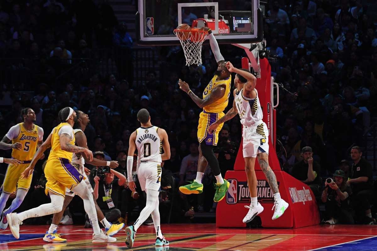 LeBron James #23 of the Los Angeles Lakers dunks the ball during the game against the Indiana Pacers during the In-Season Tournament Championship game on December 9, 2023 at T-Mobile Arena in Las Vegas, Nevada.