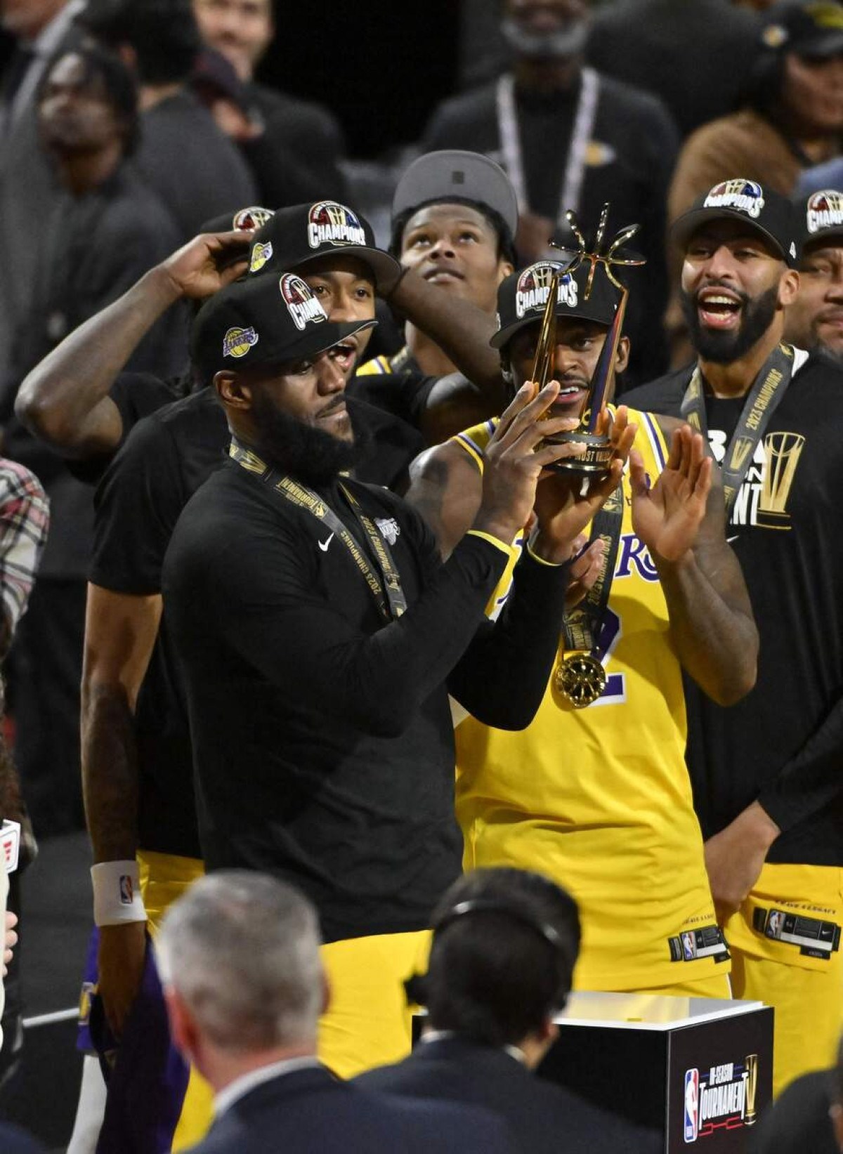 LeBron James #23 of the Los Angeles Lakers celebrates with the In-Season Tournament MVP trophy after winning the In-Season Tournament Championship game against the Indiana Pacerson December 9, 2023 at T-Mobile Arena in Las Vegas, Nevada. 