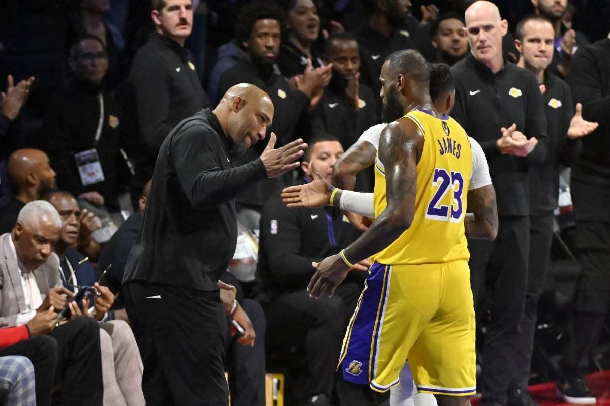 Head Coach Darvin Ham of the Los Angeles Lakers congratulates LeBron James #23 during the In-Season Tournament Championship game against the Indiana Pacers on December 9, 2023 at T-Mobile Arena in Las Vegas, Nevada. 