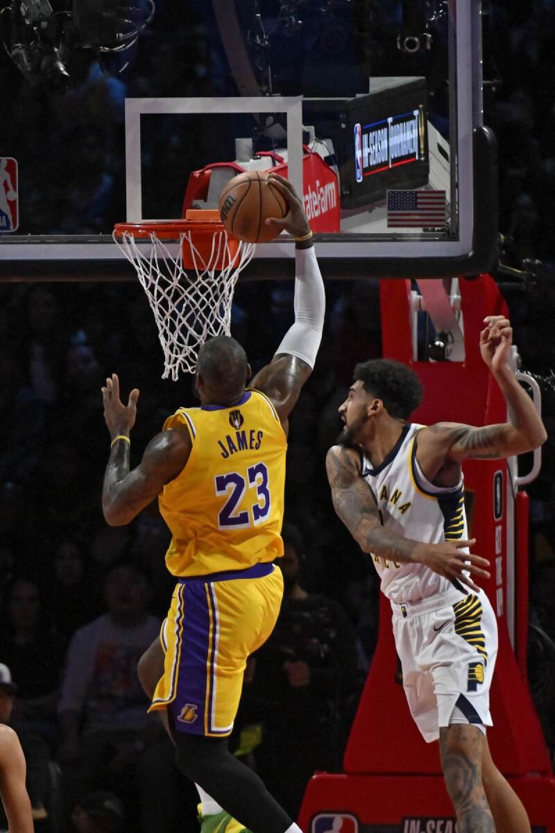 LeBron James #23 of the Los Angeles Lakers drives to the basket during the In-Season Tournament Championship game on December 9, 2023 at T-Mobile Arena in Las Vegas, Nevada. 