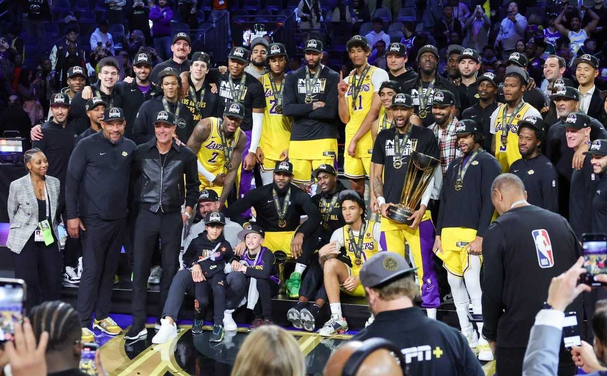 The Los Angeles Lakers pose as they celebrate their 123-109 victory over the Indiana Pacers to win the championship game of the inaugural NBA In-Season Tournament at T-Mobile Arena on December 09, 2023 in Las Vegas, Nevada.