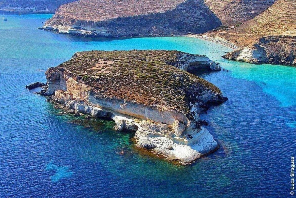 A praia de Isola dei Conigli, Lampedusa, fica localizada na Itália A praia de Isola dei Conigli, Lampedusa, fica localizada na Itália