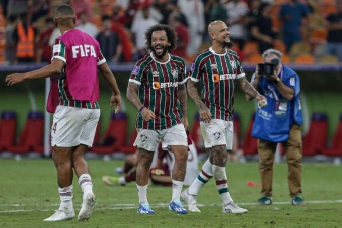 Marcelo e Felipe Melo comemoram a vitória do Fluminense sobre o Al-Ahly na semifinal do Mundial de Clubes - Foto: Lucas Merçon/Fluminense - (crédito: Foto: Lucas Merçon/Fluminense) Marcelo e Felipe Melo comemoram a vitória do Fluminense sobre o Al-Ahly na semifinal do Mundial de Clubes - Foto: Lucas Merçon/Fluminense - (crédito: Foto: Lucas Merçon/Fluminense)