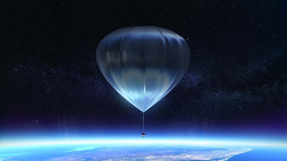 Um balão maior cheio de gás hidrogênio irá conduzir o balão em que os turistas estarão