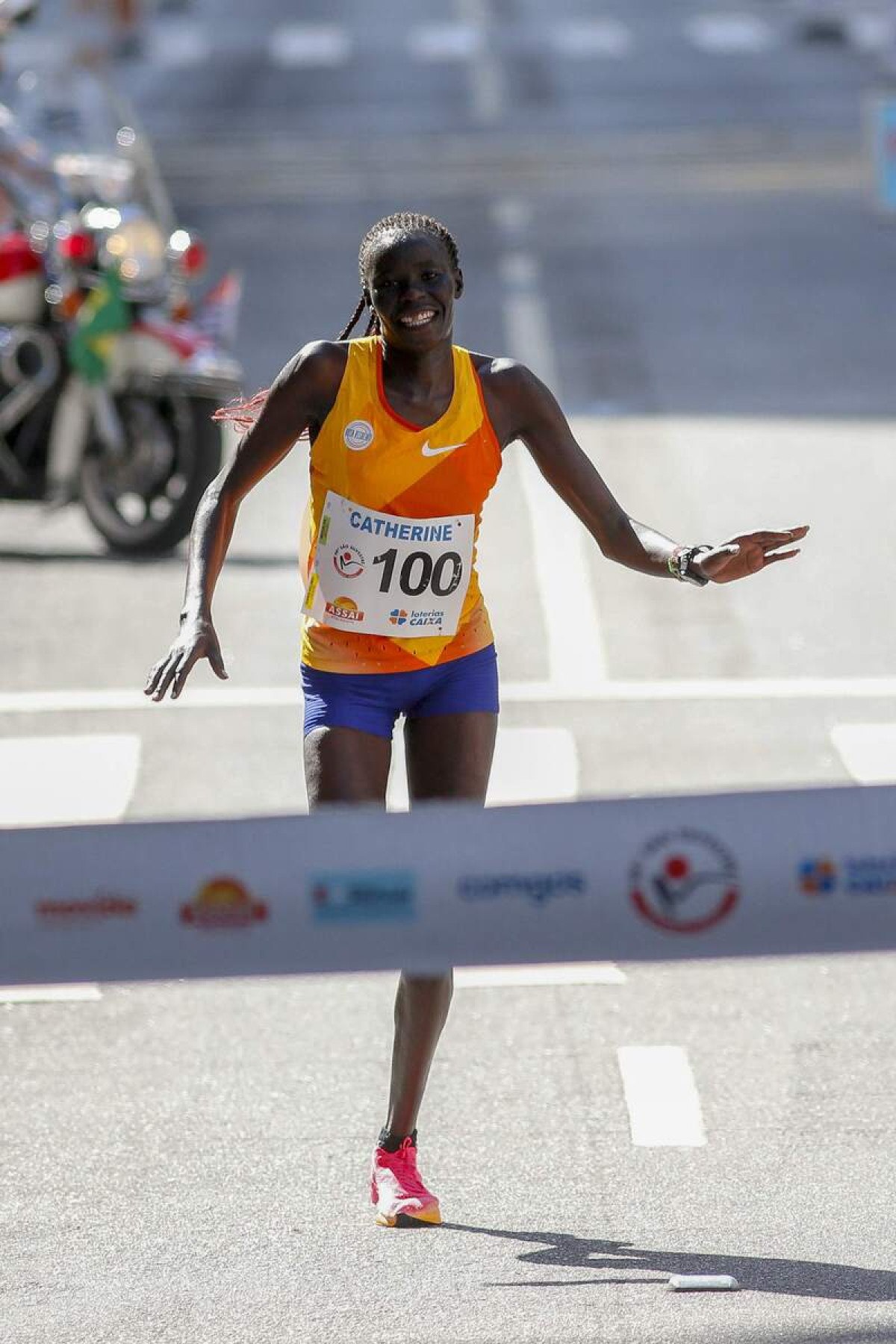 Kenyan runner Catherine Reline crosses the finish line to win the 98th 15-km Sao Silvestre international race in Sao Paulo, Brazil, on December 31, 2023.