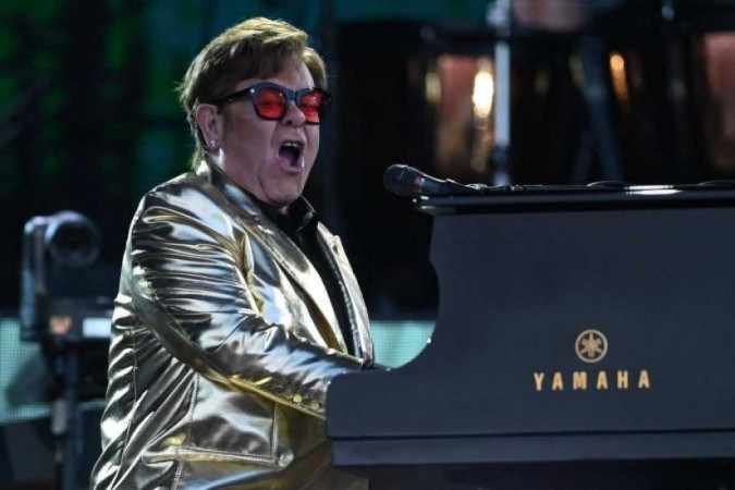 Elton John se tornou um EGOT com o Emmy que ganhou nesta segunda-feira (15/1) -  (crédito: Oli SCARFF / AFP)