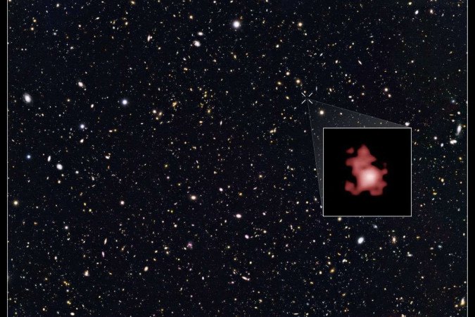 Imagem feita pelo Hubble mostrando a galáxia GN-z11, no centro na qual o Telescópio Espacial James Webb descobriu o buraco negro que tem cerca de 400 milhões de anos
       -  (crédito: AFP)