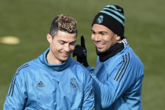 Cristiano Ronaldo e Casemiro ficaram seis meses juntos no United -  (crédito: Adrian Dennis /AFP via Getty Images)