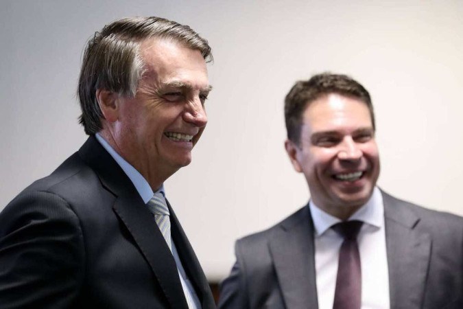 O então presidente Jair Bolsonaro e Alexandre Ramagem durante evento na Abin, em 2020  -  (crédito: Marcos Corrêa/PR)