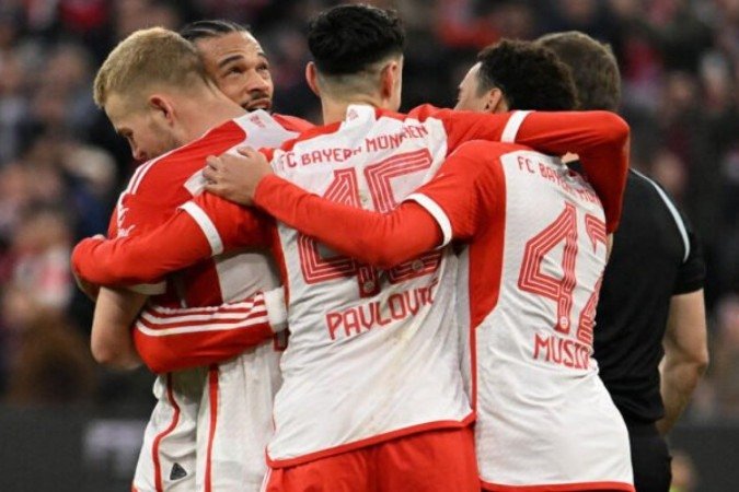 Kane celebra o seu gol, o segundo do Bayern no 3 a 1 sobre o M'Gladbach - (crédito: Foto: by Lukas Barth/AFP via Getty Images) Kane celebra o seu gol, o segundo do Bayern no 3 a 1 sobre o M'Gladbach - (crédito: Foto: by Lukas Barth/AFP via Getty Images)