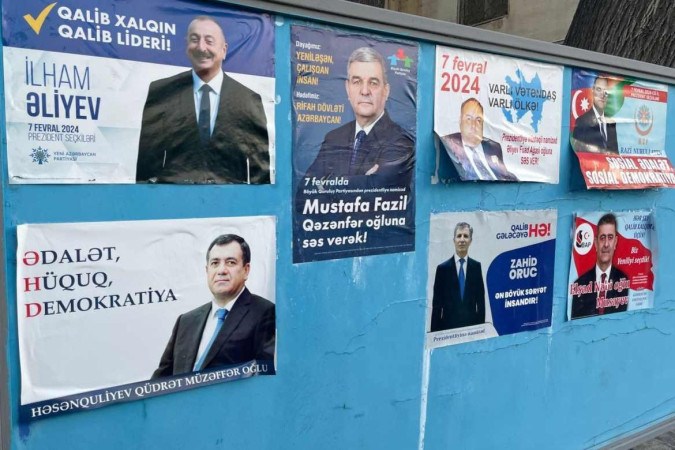 Cartazes com a propaganda dos sete candidatos a presidente foram colocados em algumas ruas de Baku: Aliyev (no alto à esquerda) será eleito para mais um mandato de sete anos  -  (crédito: Roberto Fonseca/CB/D.A.Press)