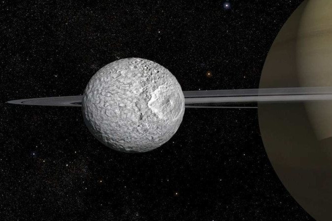 Representação artística de Mimas, satélite de Saturno, que abriga sob a superfície um improvável oceano  -  (crédito: Frédéric Durillon, Animea Studio | Observatoire de Paris - PSL, IMCCE/Divulgação)